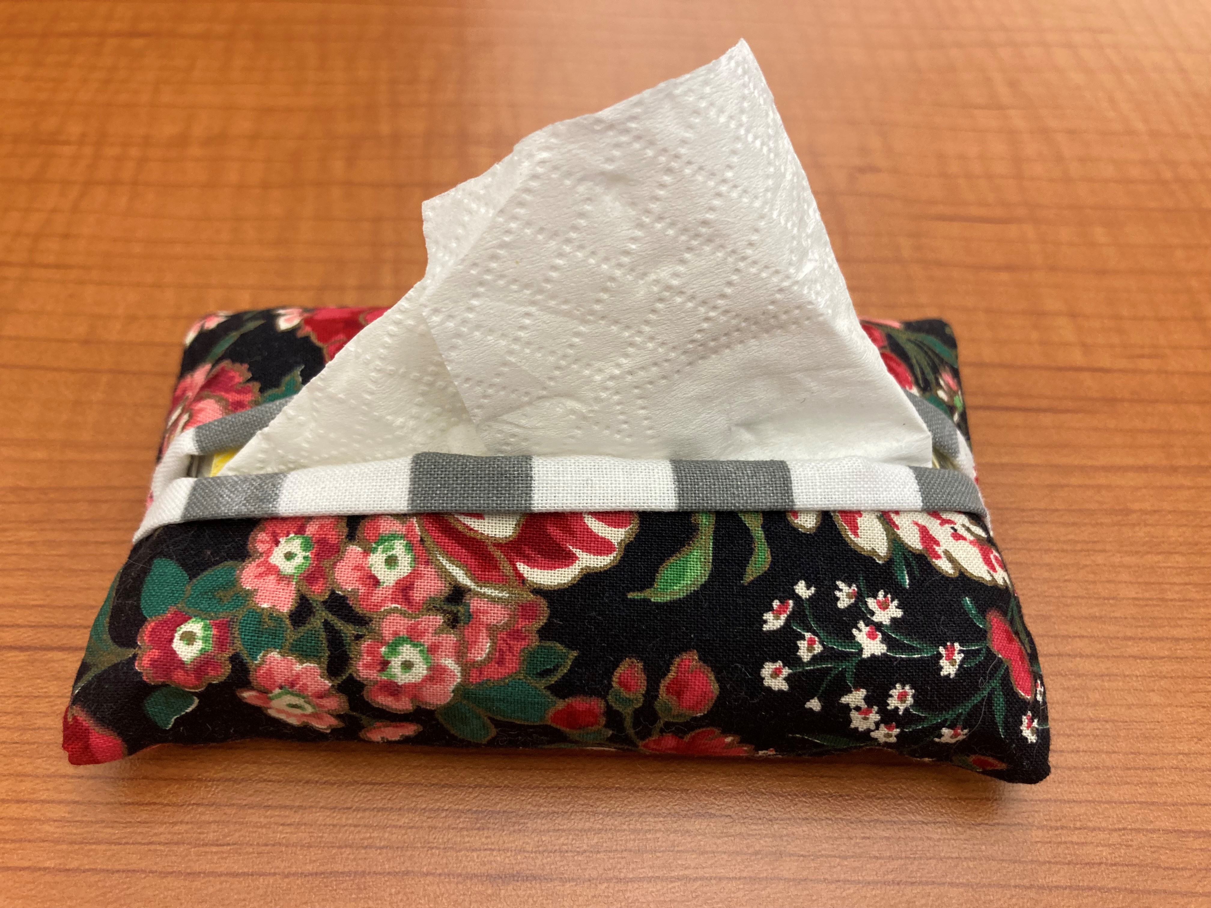 Small cloth tissue cover.