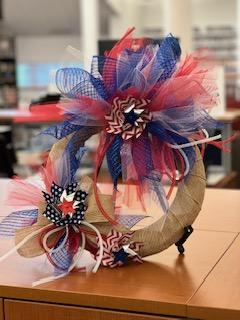 Decorative image of red white and blue wreath