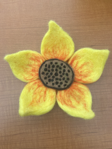 Needle felted wool in the shape of a flower