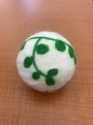 Dryer ball with wool felt decorations