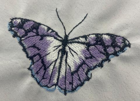 Napkin with butterfly embroidery