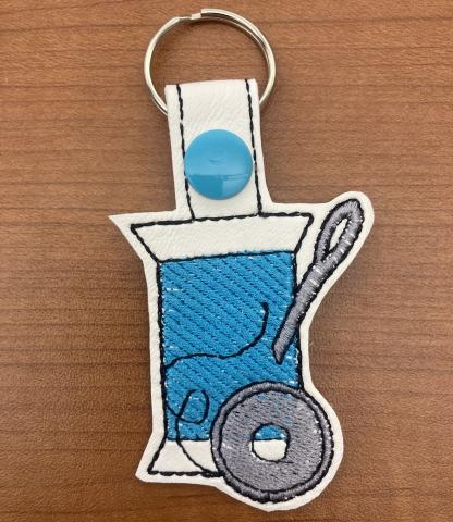Spool of thread embroidered keychain