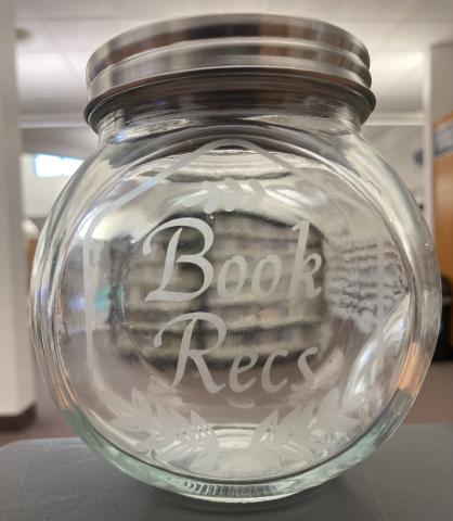 Glass jar with etched design