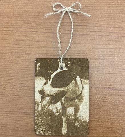 Laser engraved wood ornament with picture of dog