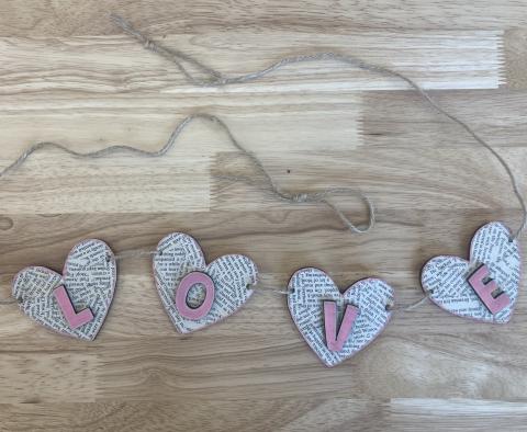 garland made of four hearts that say love