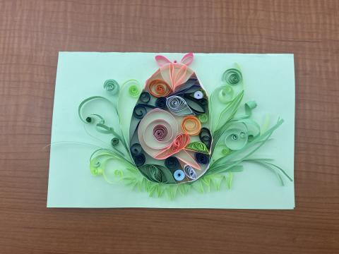 Decorative paper Easter egg made with curled strips of paper