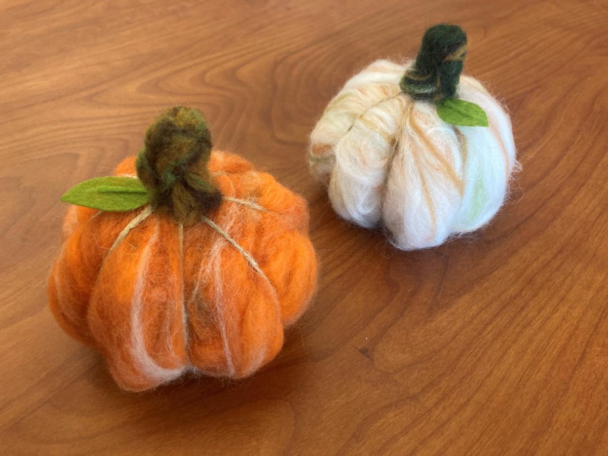 Two wool needle felted pumpkins