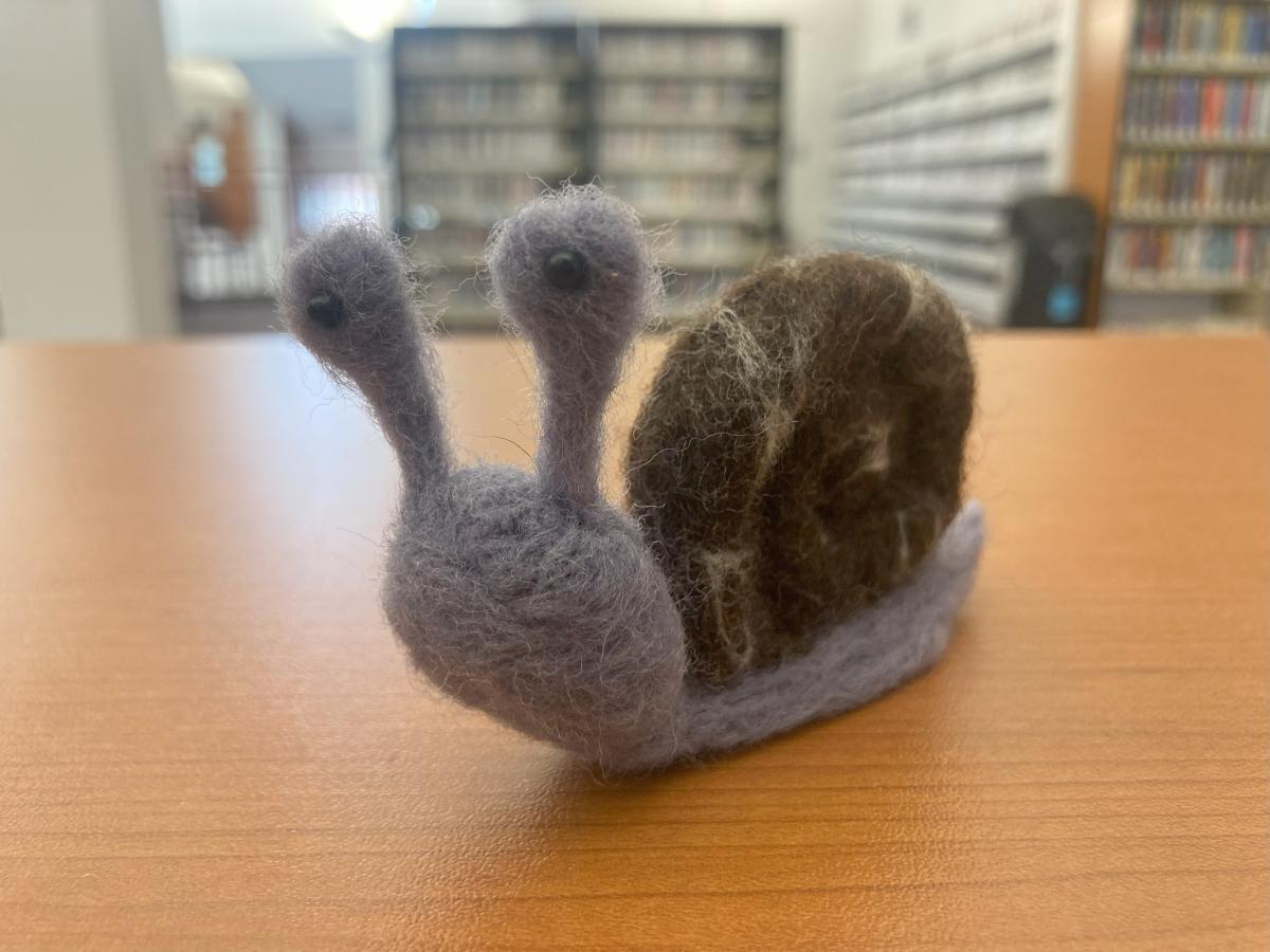 Needle felted snail
