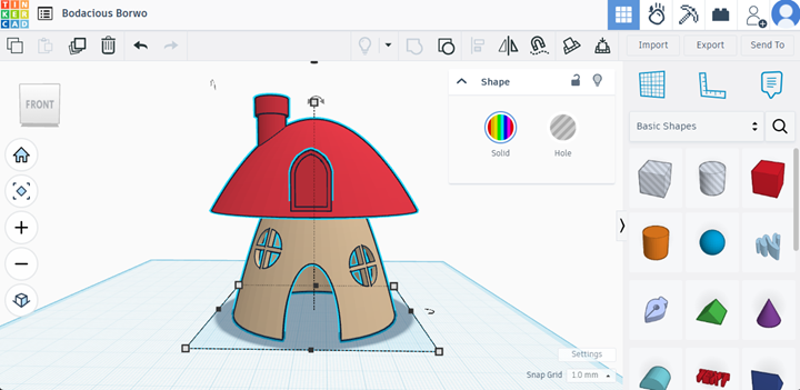 Tinkercad software with a mushroom fairy house design