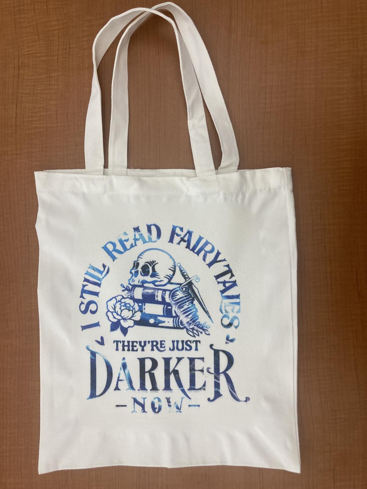 Tote bag with book themed design