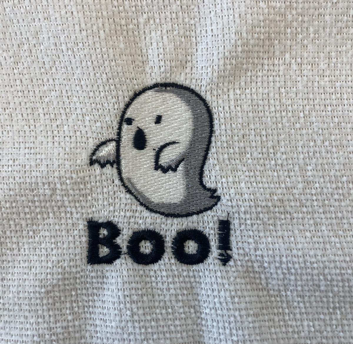 Napkin with a ghost and the word "Boo!" embroidered on it