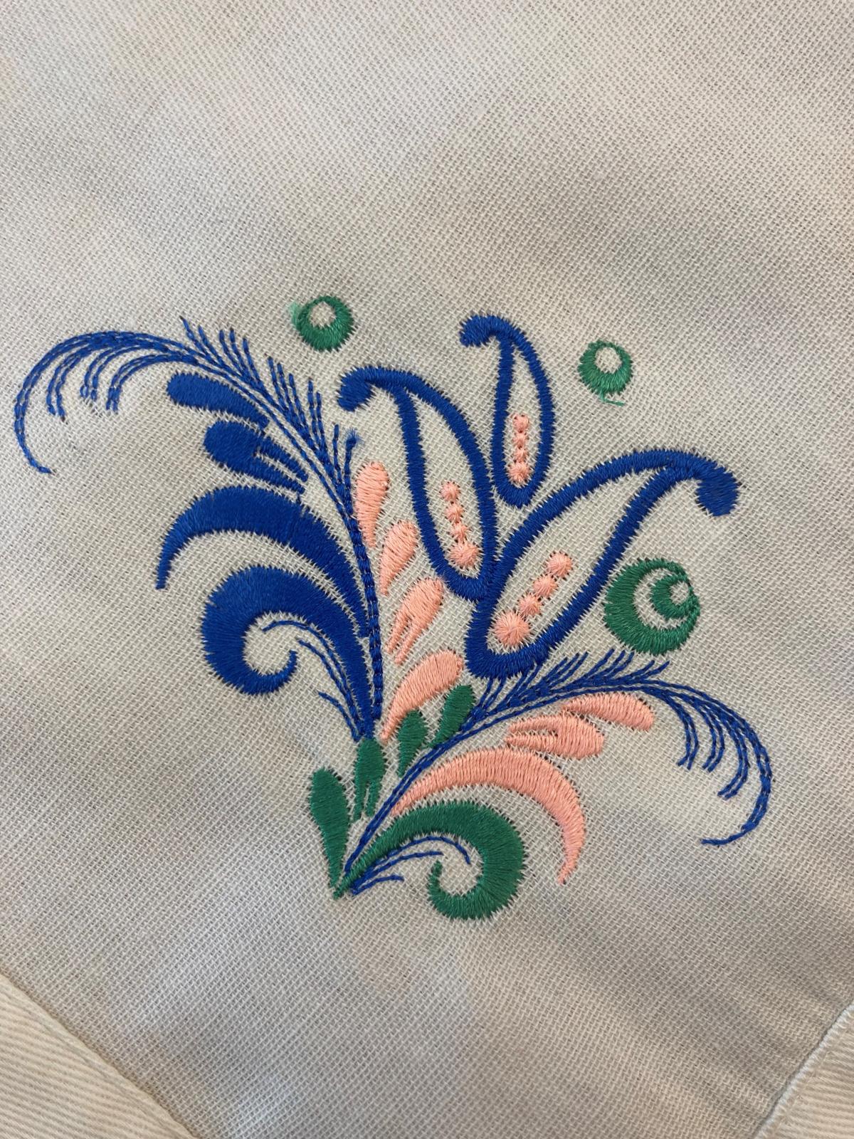 Napkin with floral embroidery design